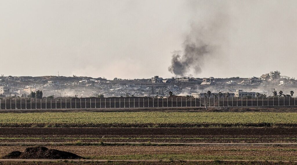 Smoke rises from the Gaza Strip, as it seen from the Israeli side of the border, June 25, 2025. Photo by Tsafrir Abayov/Flash90